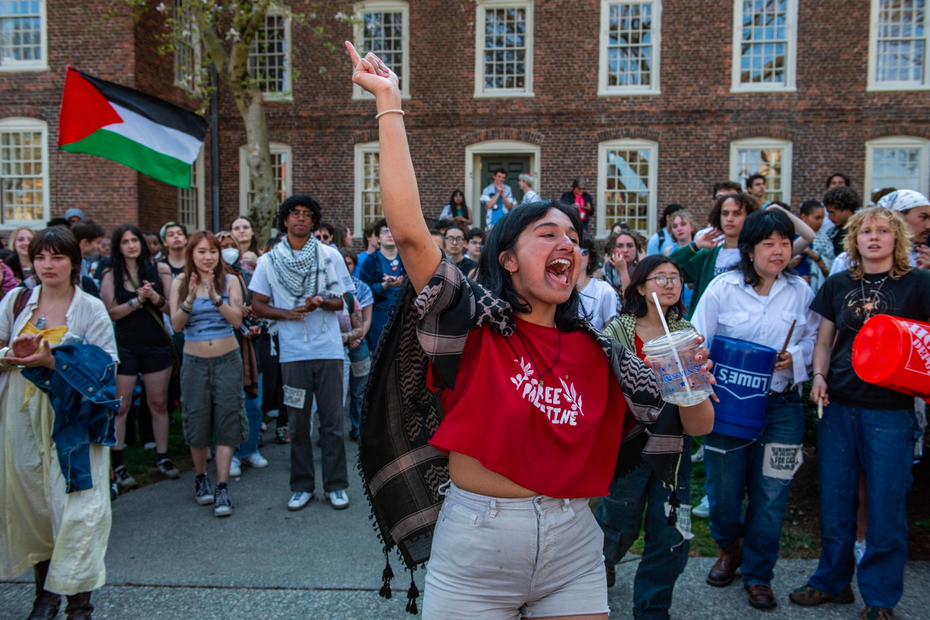 PHOTO: Pro-Palestinian protestors rally at university hall at the pro-Palestinian encampment at Brown University as they await answers from their delegation who are meeting with school leaders on campus in Providence, Rhode Island, April 29, 2024. 