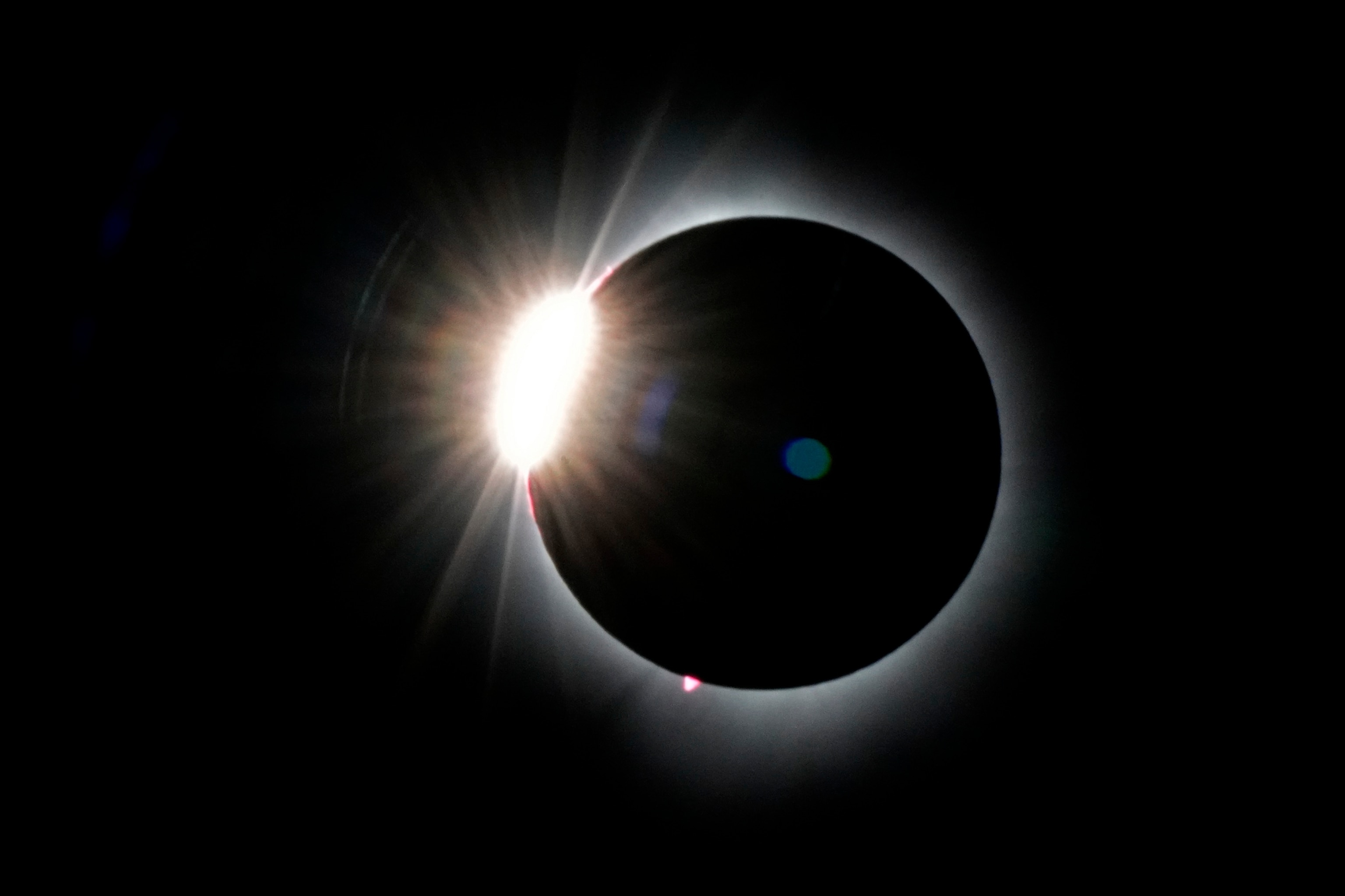 PHOTO: The moon covers most of the the sun as it approaches the total solar eclipse, as seen from the summit of Saddleback Mountain, April 8, 2024, near Rangeley, Maine. 