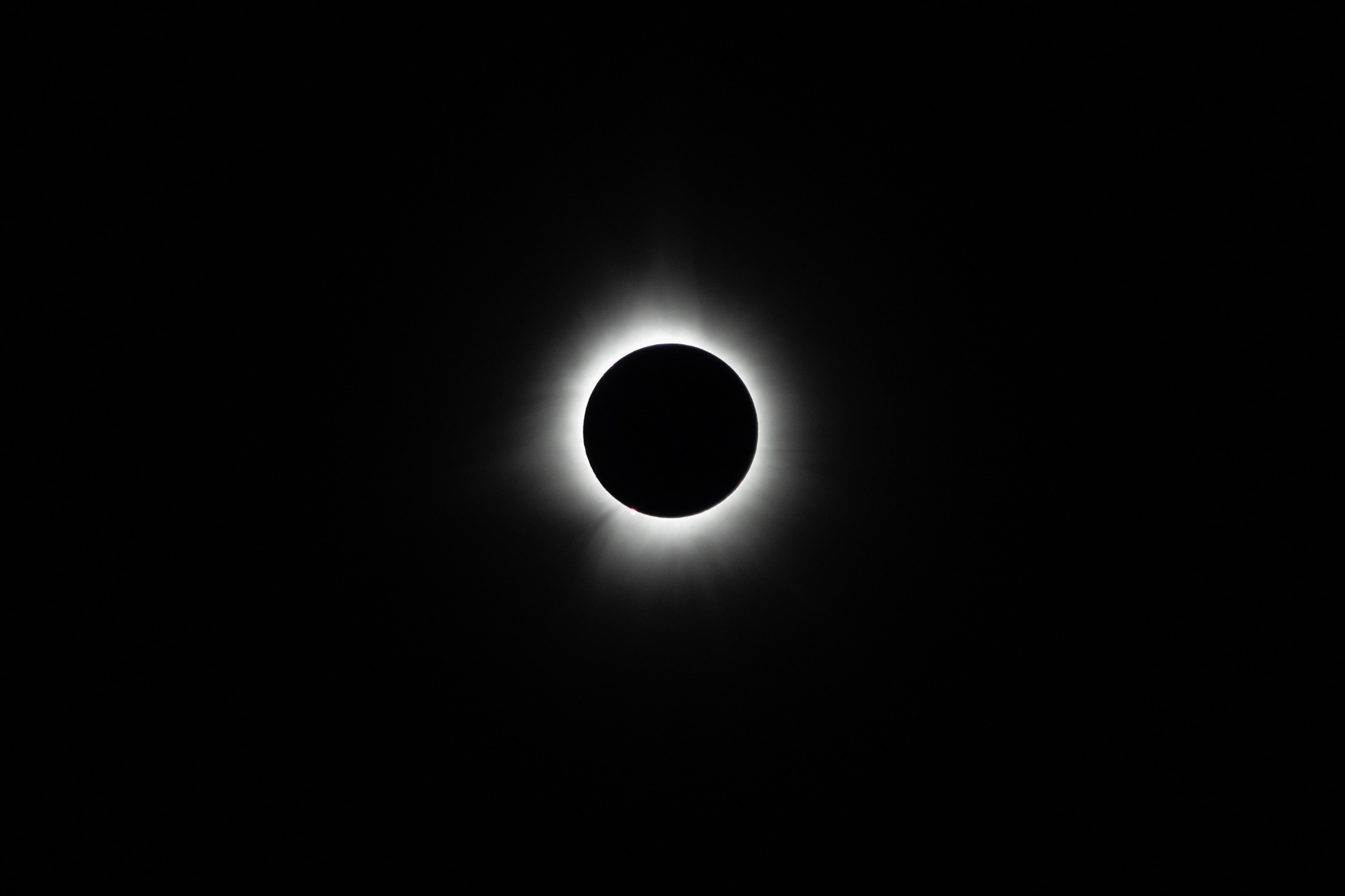 PHOTO: The moon crosses in front of the sun during the Great North American Eclipse on April 8, 2024 in Colebrook, New Hampshire. 